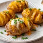 Cheesy Hasselback Potatoes topped with Sour Cream and Green Onions Recipe