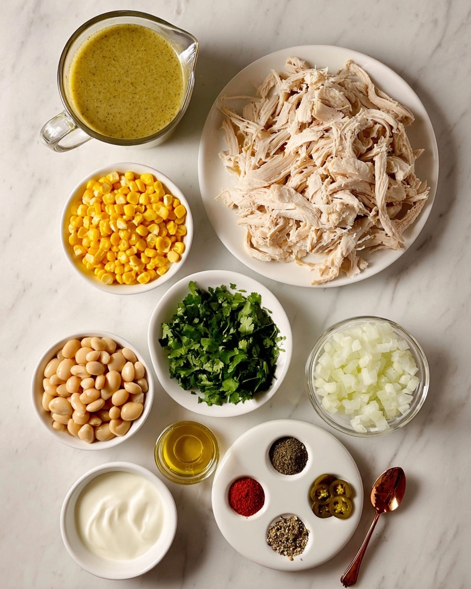 The image shows a collection of ingredients arranged neatly on a white marbled surface. In the top right, there is a large white plate filled with shredded cooked chicken, pale beige with some herb seasoning visible. To the left, a clear glass measuring cup holds a thick, light green sauce. Below, five small white bowls contain different items: light beige beans, bright yellow corn kernels, fresh green chopped cilantro, smooth white sour cream, and small dark green jalapeño slices. To the right of the sour cream bowl is a small glass bowl filled with diced white onions. At the bottom, a small white oval dish contains finely minced garlic. Next to it, a round white dish holds an assortment of spices in separate sections, including red, green, brown, black, and white powders. A small copper spoon filled with a golden liquid is placed near the onion bowl. photo taken with an iphone --ar 4:5 --v 7