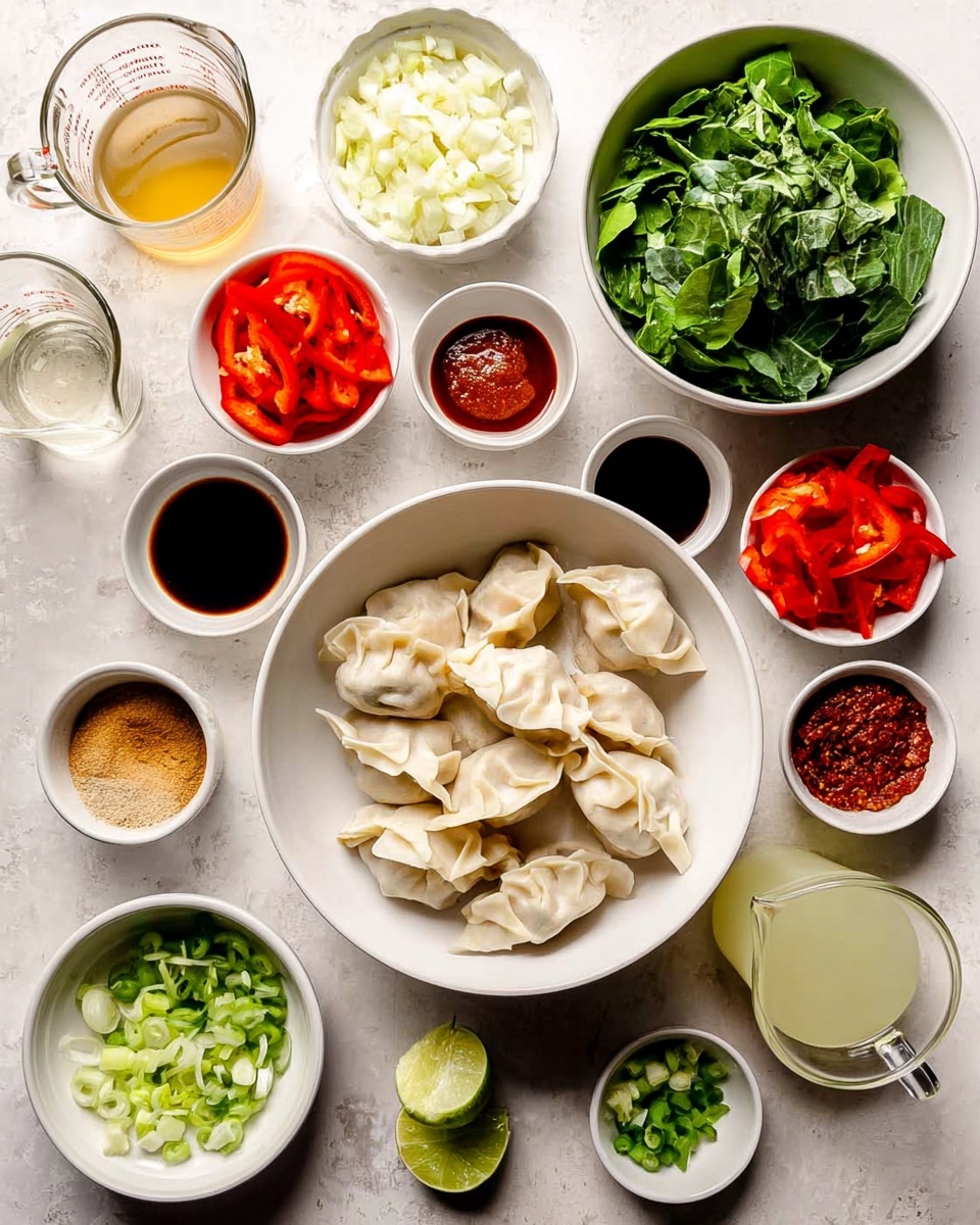 The image shows several small white bowls arranged on a white marbled surface. In the center, a large white bowl holds uncooked dumplings with a pale, soft dough texture, slightly folded and stacked. To the top right, another large white bowl contains chopped green leafy vegetables with a mix of dark and light green shades. Surrounding them are smaller white bowls filled with bright red sliced bell peppers, finely chopped white onions, chopped green onions, minced garlic of pale yellow color, red chili paste, and a dark soy sauce. There are also bowls with light brown ground ginger, a dark chili oil mixture, a small amount of pale yellow liquid, and a glass measuring cup with a light brown broth. A lime and a small glass of a pale clear liquid are also visible. The overall setup is clean, bright, and organized for cooking preparation. photo taken with an iphone --ar 4:5 --v 7