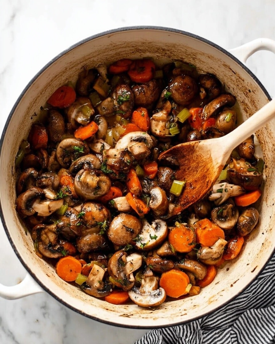 A white pot filled with cooked mushrooms and sliced carrots mixed with small pieces of celery. The mushrooms are brown with a soft texture and arranged all over the pot, while the carrot slices are bright orange and scattered evenly. A wooden spoon rests inside the pot, slightly stained from cooking, positioned near the right edge. The pot sits on a white marbled surface with a black and white striped cloth nearby. The overall image shows a warm, earthy mix of cooked vegetables. photo taken with an iphone --ar 4:5 --v 7