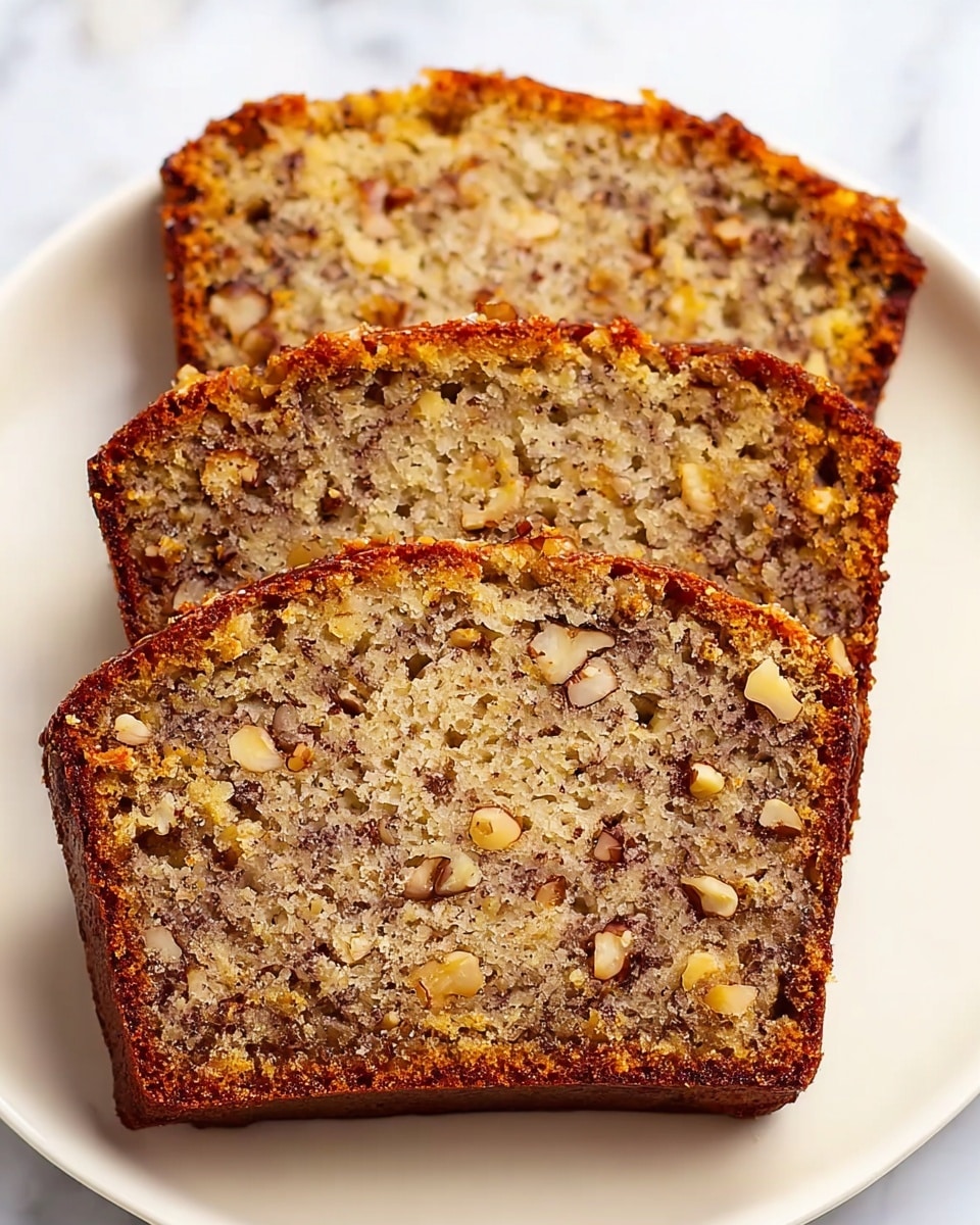Three ripe yellow bananas with brown spots lay at the bottom right on a white marbled surface. Two brown eggs are placed to the left of the bananas. Above the eggs sits a small white bowl filled with dark raisins, next to a slightly larger white bowl filled with walnuts. Above the walnuts, there is a small white bowl filled with white salt, and to the right of the walnuts, a larger white bowl filled with white flour. At the very top left, a white bowl holds three large pieces of pale yellow butter. photo taken with an iphone --ar 4:5 --v 7