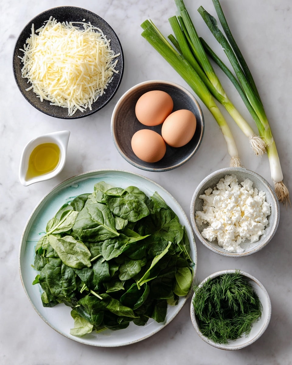 A white plate with a light blue rim sits on a white marbled surface in the center, surrounded by various ingredients: a large white plate filled with fresh dark green spinach leaves, with bright green spring onions lying across it; to the left, a black bowl filled with shredded pale yellow cheese and above it a small white cup with golden olive oil; next to that, a dark bowl holding three brown eggs; on the right side, a gray bowl full of white crumbly cheese and below it a small white bowl with fresh green dill. photo taken with an iphone --ar 4:5 --v 7