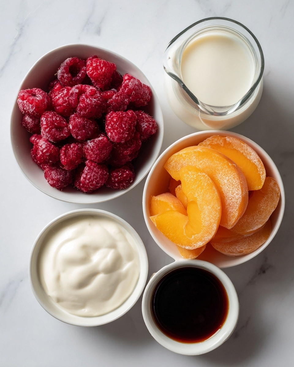 The image shows four white bowls and a small white jug arranged on a white marbled surface. The top left bowl is filled with bright red frozen raspberries with a rough texture. Below it, on the left, is a small bowl with smooth white yogurt that looks creamy. The bowl at the bottom left contains dark brown liquid, likely syrup or extract, with a glossy surface. On the right side of the image is a larger bowl holding thick slices of orange frozen peaches covered lightly with frost. Above it is a clear glass jug filled with white milk, showing a smooth and clean surface. The lighting is soft and natural, highlighting the colors and textures clearly photo taken with an iphone --ar 4:5 --v 7