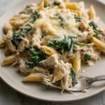 High Protein Creamy Chicken Spinach Artichoke Pasta Bake Recipe