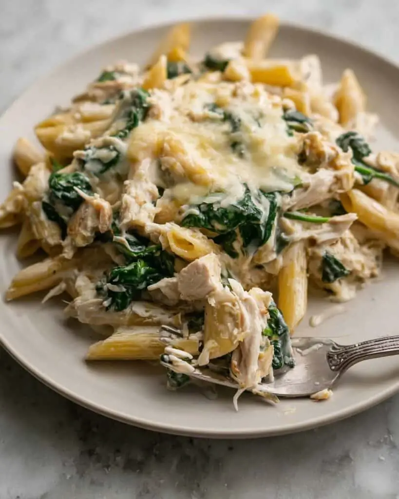 High Protein Creamy Chicken Spinach Artichoke Pasta Bake Recipe