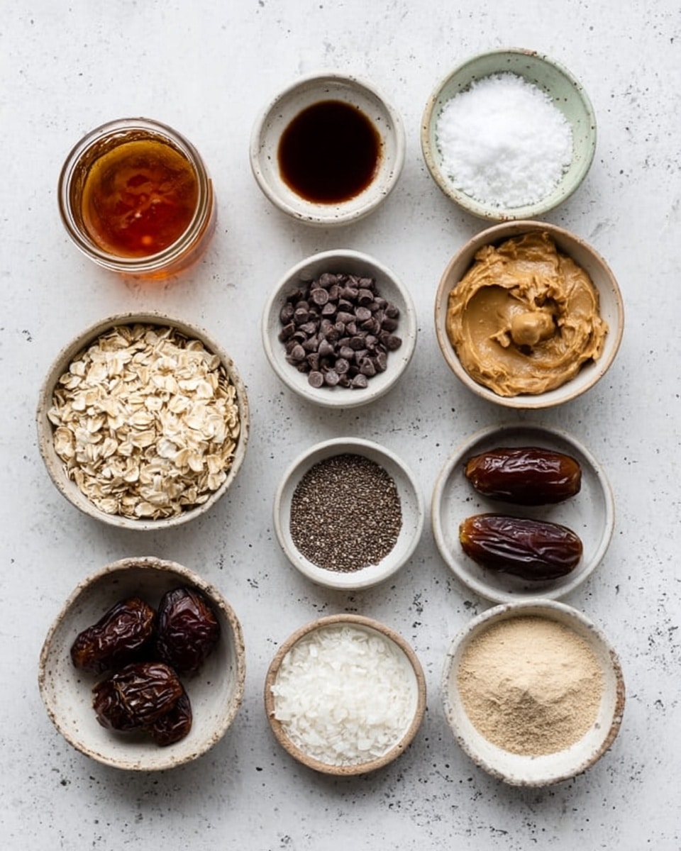 The image shows a top view of 12 small white bowls arranged on a white marbled surface, each holding different ingredients for a recipe. From the top left, there is a small glass jar filled with dark amber honey, followed by a bowl with dark brown liquid, then a bowl of white coarse salt. In the second row, there is a bowl full of chocolate chips, a bowl of golden brown creamy peanut butter, and a bowl of rolled oats with light beige color. The third row has a bowl with smaller chocolate chips, a bowl of tiny black chia seeds, a bowl filled with white shredded coconut flakes, and a bowl with two dark brown dates. In the last row, the bowls hold beige pea protein powder, white coarse salt, and a small bowl of coconut oil. All bowls have rough edges and the items are neatly arranged on the white marbled surface. photo taken with an iphone --ar 4:5 --v 7
