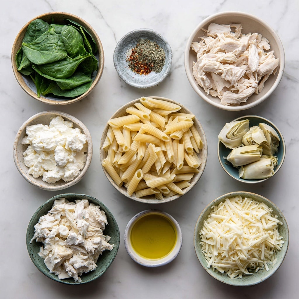 The image shows a large silver rectangular foil tray filled with baked pasta. The dish has one visible layer of spiral pasta mixed with green leafy vegetables and chunks of white meat, all covered by a thick layer of melted, lightly browned cheese that looks creamy and bubbly. The tray is placed on a dark surface with a white cloth beside it. The photo taken with an iphone --ar 4:5 --v 7