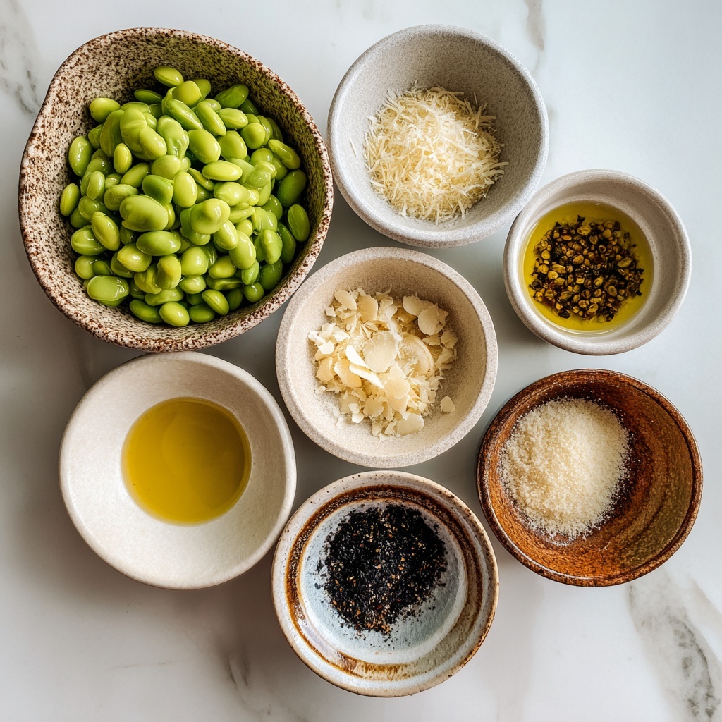 A white bowl filled with bright green edamame pods covered in a crunchy light brown and orange powder seasoning. The seasoning is spread unevenly, adding texture and color contrast against the smooth green pods. The bowl sits in front of a window, with natural light shining on the edamame, highlighting the light granules of the seasoning and the soft shine of the pods. The background surface is a white marbled texture. Photo taken with an iphone --ar 4:5 --v 7